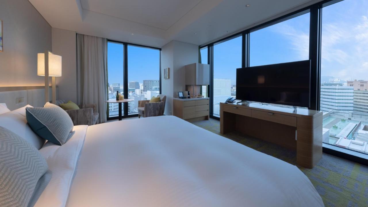 Miyako Hotel Hakata Fukuoka  Bagian luar foto A bedroom at the hotel